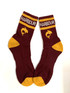 Sports quarter socks in maroon and gold with a logo and text on the cuff.
