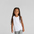 A white kids' tank top is worn by a child with long hair, paired with grey pants. The top features a logo.