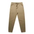 A pair of beige track pants with an elastic waistband and cuffs, featuring a drawstring and a logo.