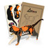 A wooden cat model with a black and orange pattern, accompanied by design templates and packaging.