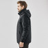 A black men's jacket with a hood, featuring a sleek design and side pockets. It includes a logo on the fabric.