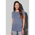 A woman wearing a blue recycled sports T-shirt, smiling and posing against a grey background. The shirt features a logo.