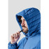 A blue quilted hoody with a hood, featuring a cinch cord, shown on a model.
