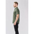 A men's short-sleeve button-up shirt in olive green, featuring a side view with a logo displayed.