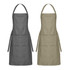 Two aprons in grey and khaki, featuring a simple design with adjustable straps and a pocket. Both have a logo.