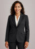 A women's longline jacket in black, featuring a tailored fit, lapel collar, and pockets. The model is smiling.