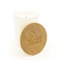 A medium glass candle with a white body and a wooden lid, featuring a logo on the lid.