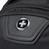 A close-up of a black backpack featuring a logo and a zipped pocket. The material appears durable and textured.