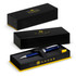 A Cross Bailey ballpoint pen in a black and gold box, featuring a navy blue pen secured with a black strap.