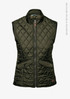 A quilted vest in dark green, featuring a zip front and two front pockets, with a small logo.