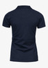 A navy polo shirt with a classic fit and short sleeves. The shirt features a logo.