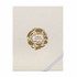 A cream-coloured journal with a gold decorative logo featuring floral designs and the words "Ideas Journal."