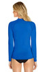 A bright blue long sleeve rashie with a fitted design and a high neck, featuring a logo on the back.