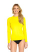 A bright yellow long sleeve rashie with UPF 50+ protection, modelled by a woman wearing black swimwear.