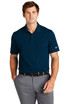 A navy short-sleeve polo shirt featuring a collar and a logo on one sleeve. Styled with grey trousers.