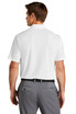 A man wearing a white Nike Dri-FIT Micro Pique 2.0 Pocket Polo from the back, paired with grey trousers.
