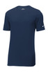 A navy blue Nike Dri-FIT T-shirt with short sleeves and a logo on the sleeve. A navy blue Nike Dri-FIT T-shirt with short sleeves and a logo on the sleeve.