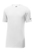 A white Nike Dri-FIT cotton/poly T-shirt with short sleeves and a small logo on the sleeve. A white Nike Dri-FIT cotton/poly T-shirt with short sleeves and a small logo on the sleeve.