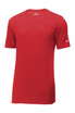 A red Nike Dri-FIT cotton/polyester T-shirt with a logo on the sleeve. A red Nike Dri-FIT cotton/polyester T-shirt with a logo on the sleeve.