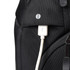 A black backpack featuring a USB charging port and a textured fabric design, with a logo on the front. A black backpack featuring a USB charging port and a textured fabric design, with a logo on the front.