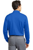 A back view of a blue long sleeve polo shirt with a logo, paired with grey trousers.