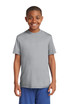 A smiling boy is wearing a grey Sport-Tek Youth PosiCharge Competitor Tee, paired with blue shorts. A smiling boy is wearing a grey Sport-Tek Youth PosiCharge Competitor Tee, paired with blue shorts.