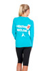 A women's long sleeve T-shirt in heather turquoise with a logo on the back, paired with black leggings.