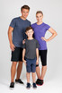 A group features three models wearing Kids Heather Tees in purple and dark grey, showcasing a casual style.