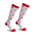 Compression socks in white with red accents, featuring various health-themed patterns and a logo.