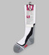 Compression socks in white and grey with a black design, featuring a hanging tag with product information.
