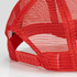 A red mesh trucker cap featuring a structured front and adjustable snapback closure.