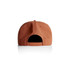 A rust-coloured cap with an adjustable strap and a logo on the back. The cap features a flat brim design.