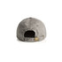 A grey cap with a curved peak and an adjustable strap at the back. It features a logo on the side.