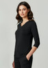 A black women's 3/4 sleeve top with a V-neck design and a fitted silhouette. It features a logo on the garment.