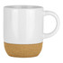 A ceramic mug in white with a cork bottom detail, featuring a handle and a sleek design.