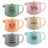 A collection of six teapots in pastel shades, each featuring a logo and unique design elements.