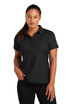 A black polo shirt featuring a collar and a short sleeve design, worn by a model. The shirt has a logo on one sleeve.