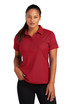 A red polo shirt with a collar and short sleeves, featuring a logo on one sleeve.