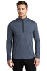 A long-sleeve, navy blue 1/4-zip top, featuring a collar and fitted design, with a logo on the garment.