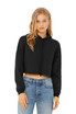 A black cropped fleece hoodie featuring a hood and drawstring, paired with blue jeans. The model poses casually.