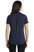 A navy blue ladies' polo shirt with a back pleat and short sleeves, featuring a collar and a logo.