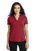 A red OGIO ladies polo shirt with a collar and short sleeves, featuring a logo on the chest.