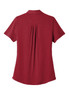 A red ladies' polo shirt featuring a pleat detail at the back and short sleeves, with a logo.