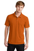 A man wearing an orange OGIO Caliber 2.0 polo shirt, featuring a small logo on the sleeve.