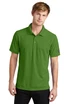 A green polo shirt is worn by a male model, featuring a collar and short sleeves, with a logo on the sleeve.