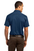 A man is wearing a navy blue OGIO Hybrid Polo shirt, viewed from the back.