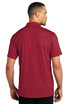 A burgundy polo shirt from the back, featuring a collar and a logo on the shoulder.