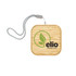 A square wireless charger in bamboo with a logo and a woven strap for easy carrying.