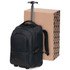 A black trolley backpack with wheels and a retractable handle beside a cardboard box.