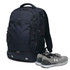 A navy backpack with multiple pockets, accompanied by a pair of grey sports shoes. The bag has a logo.